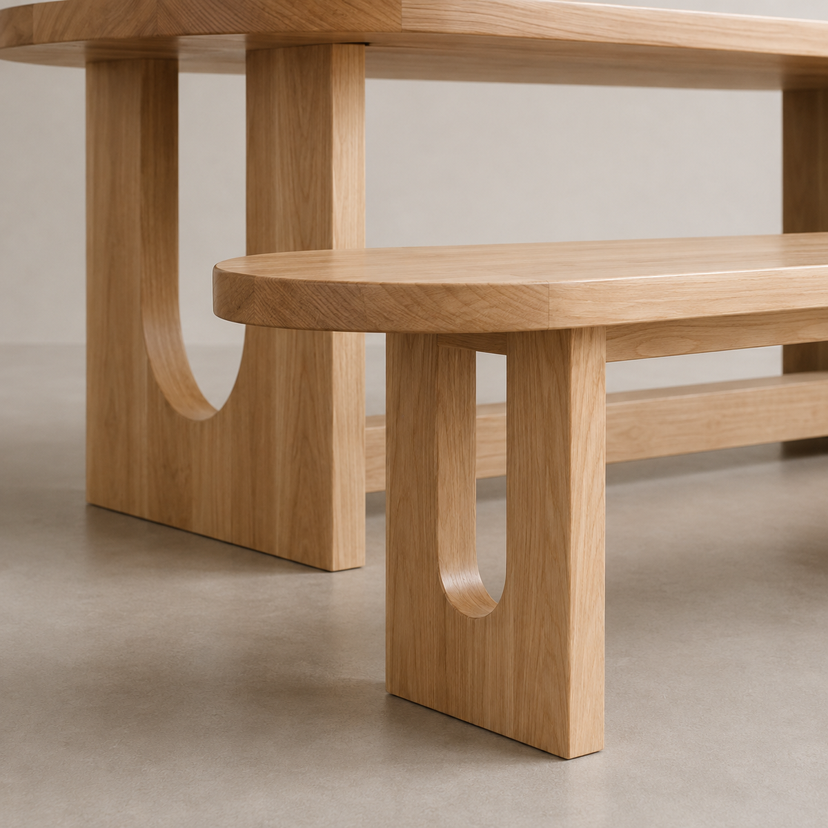 Alaina pill-shaped solid elm dining bench with sculptural wood U-legs, handcrafted from recycled Winnipeg elm trees