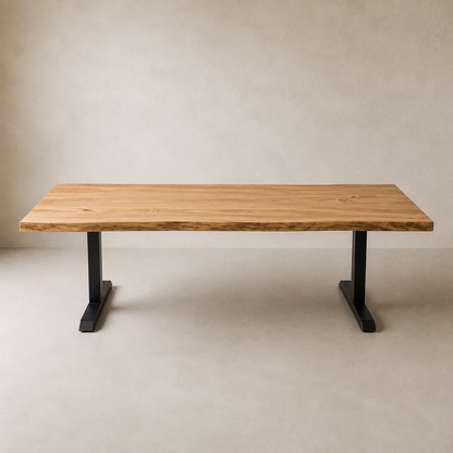 A rectangular wooden table with a live-edge natural elm top and black metal pedestal legs, shown against a neutral textured beige studio background.