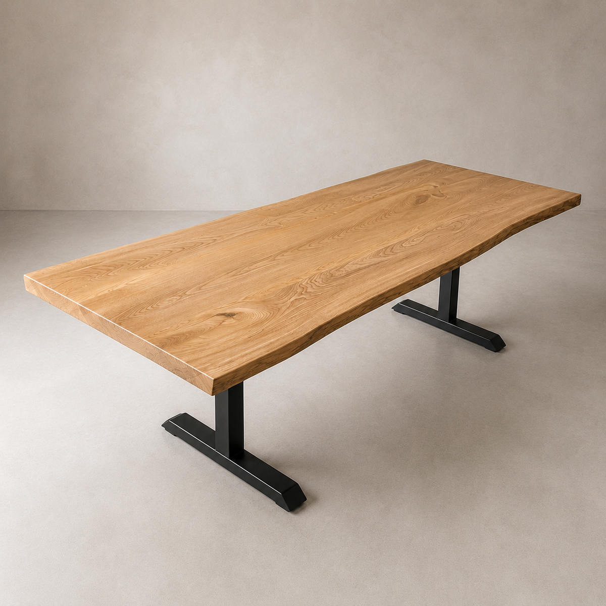 A live-edge elm dining table with a warm natural wood top and black metal T-style legs, photographed in a minimalist studio setting with a neutral textured beige background.