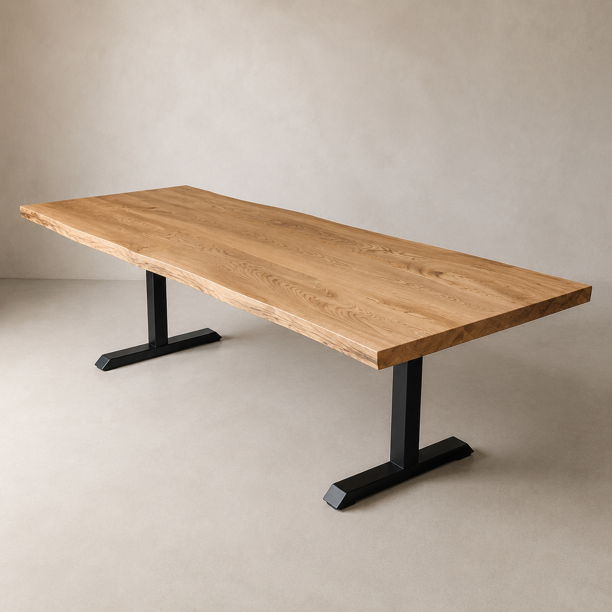 A live-edge wooden dining table with a natural elm top and black metal T-style legs, photographed in a minimalist studio setting with a warm beige background.